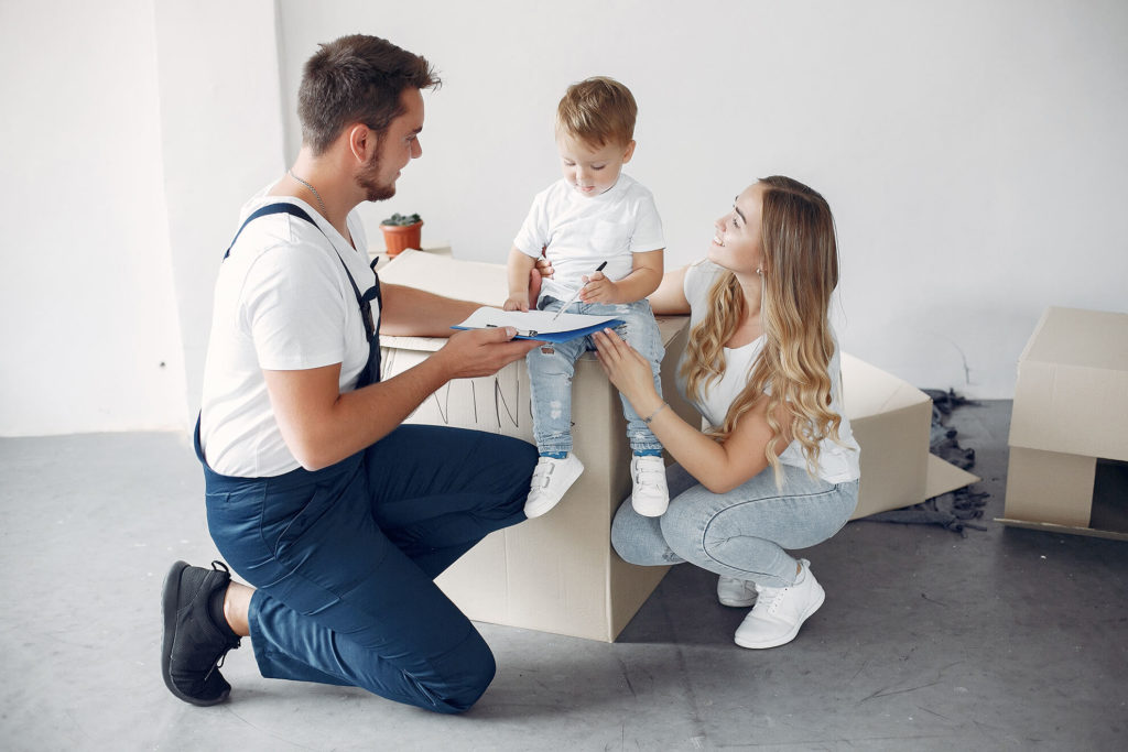 family-moving-using-boxes